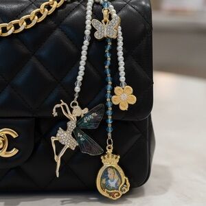 NWT ALICE IN WONDERLAND BAG CHARM KEYCHAIN TOOTH FAIRY FLORAL CROWN
